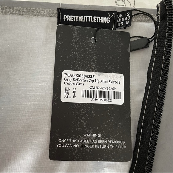 ⭐️ 4/$10 Reflective zip up mini skirt - Picture 5 of 5